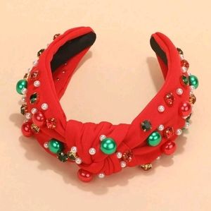 Red headband with multicolored stones and pearls